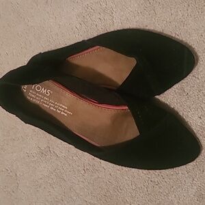 Toms black flats size 7.